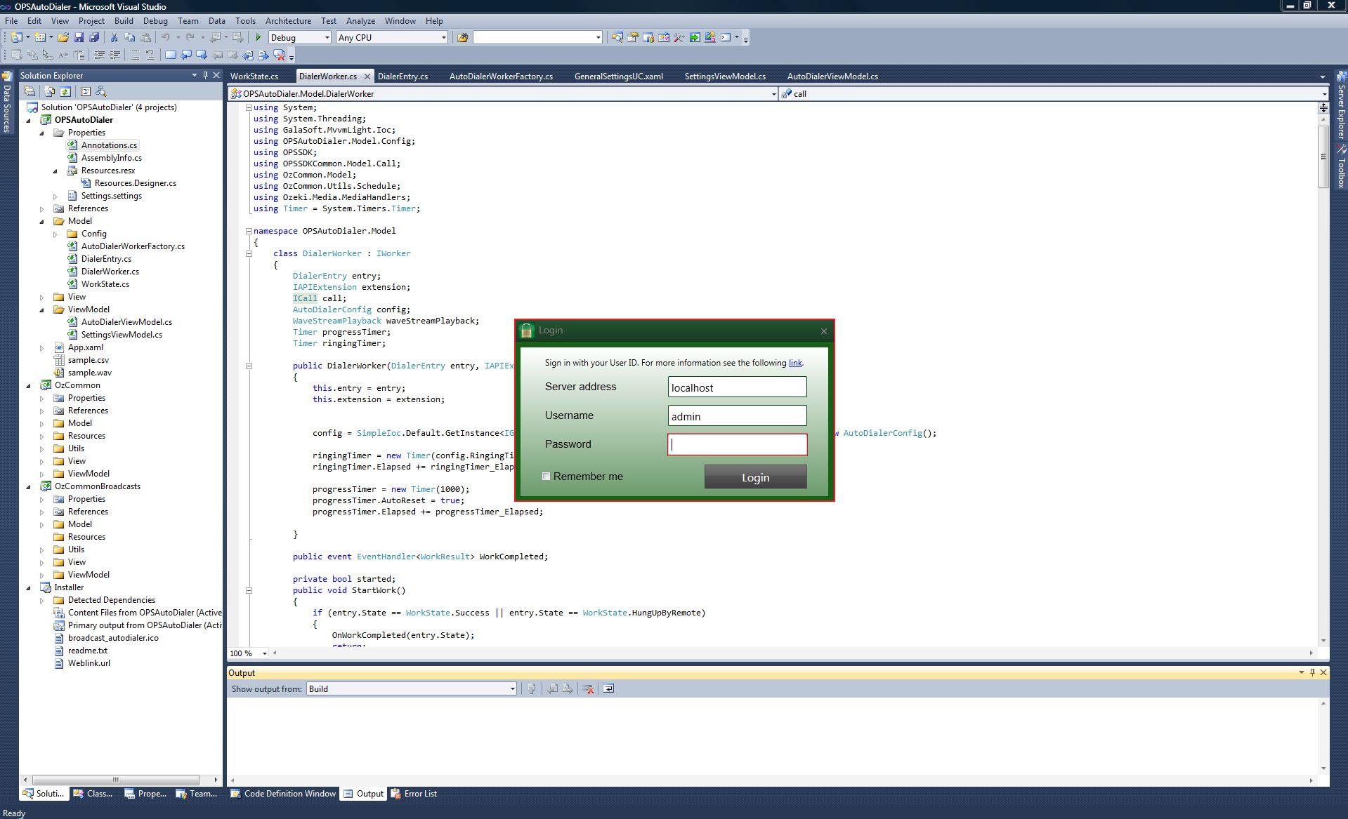 starting window of opsautodialer program with source code in background